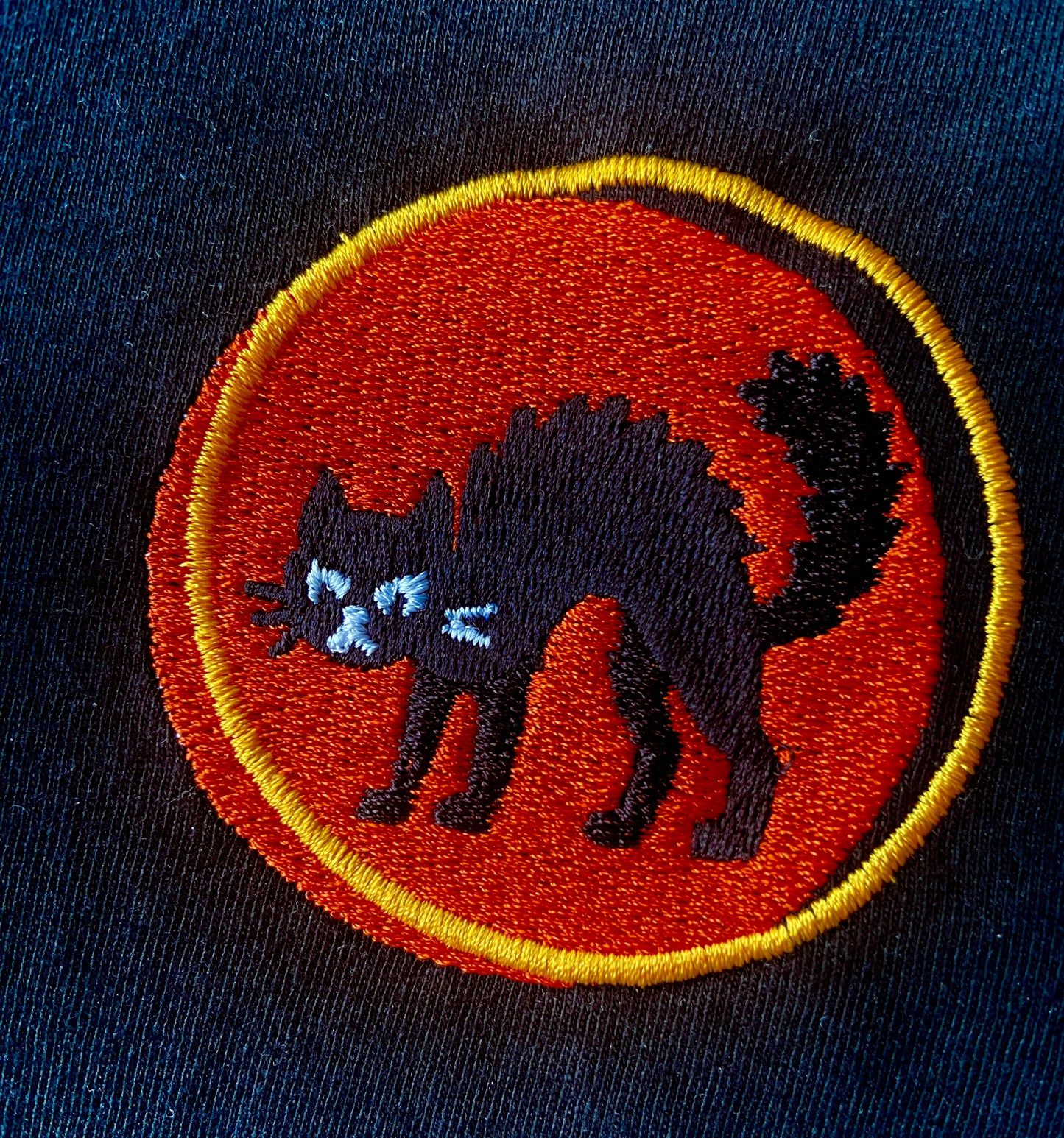 Black Embroidered Bad Katt T-Shirt – Orange Pulse Edition